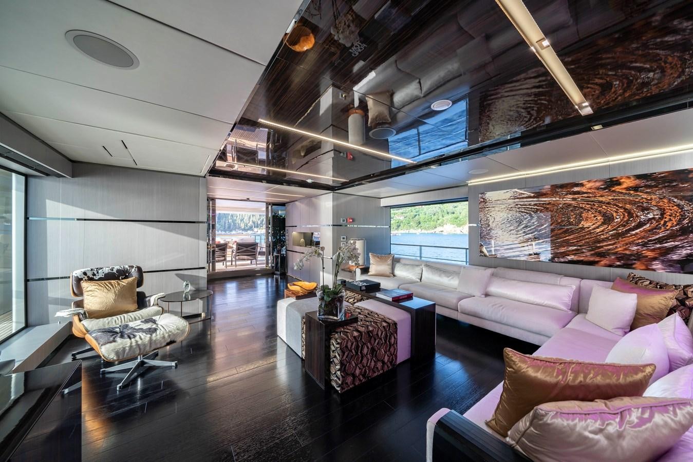 a living room with a large window aboard MAVERICK Yacht for Sale