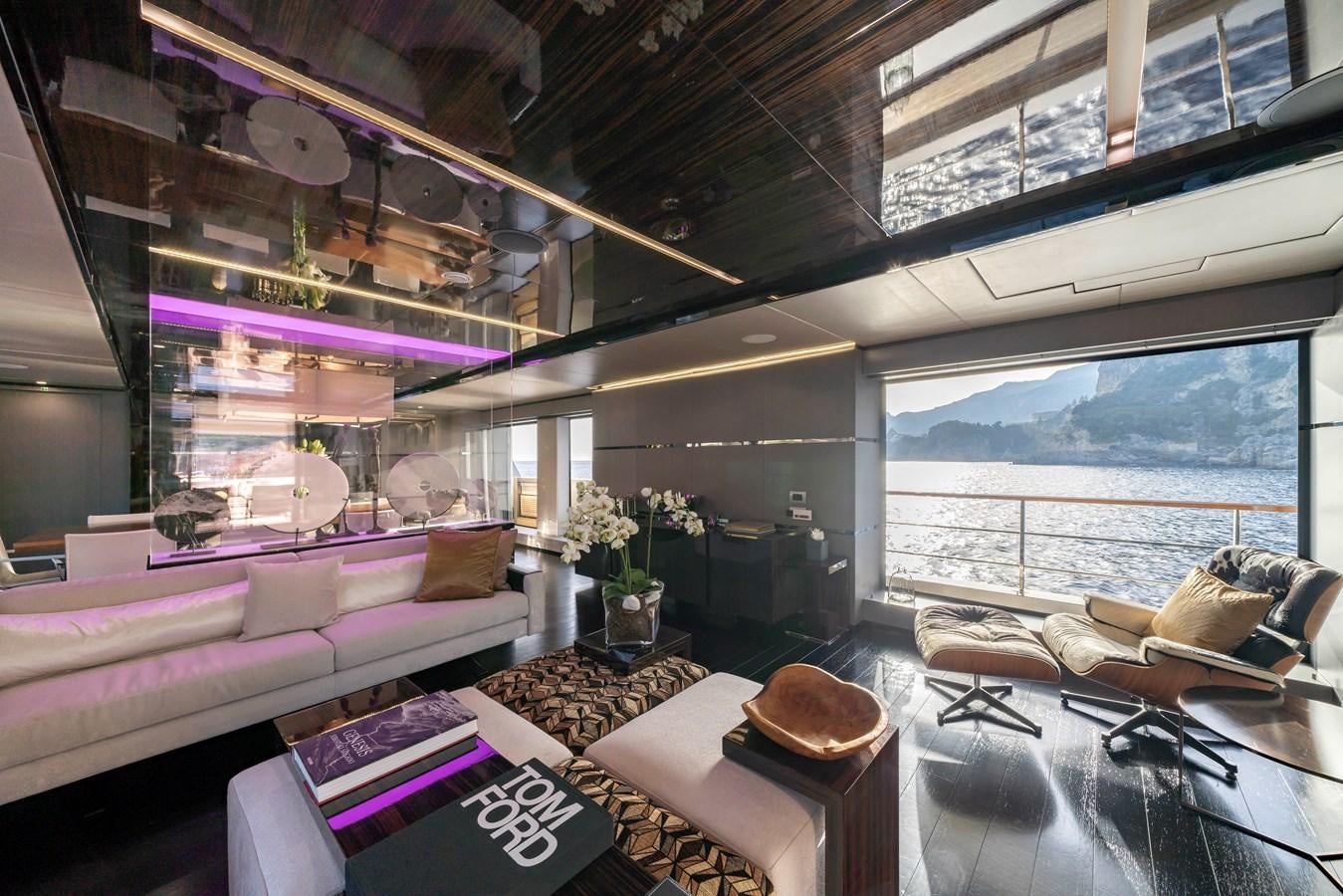 a living room with a large window aboard MAVERICK Yacht for Sale