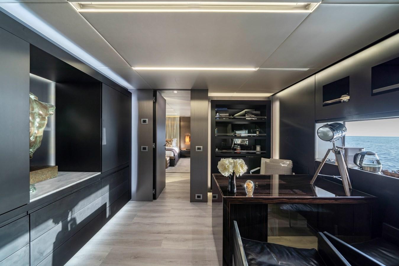 a room with a desk and a computer aboard MAVERICK Yacht for Sale