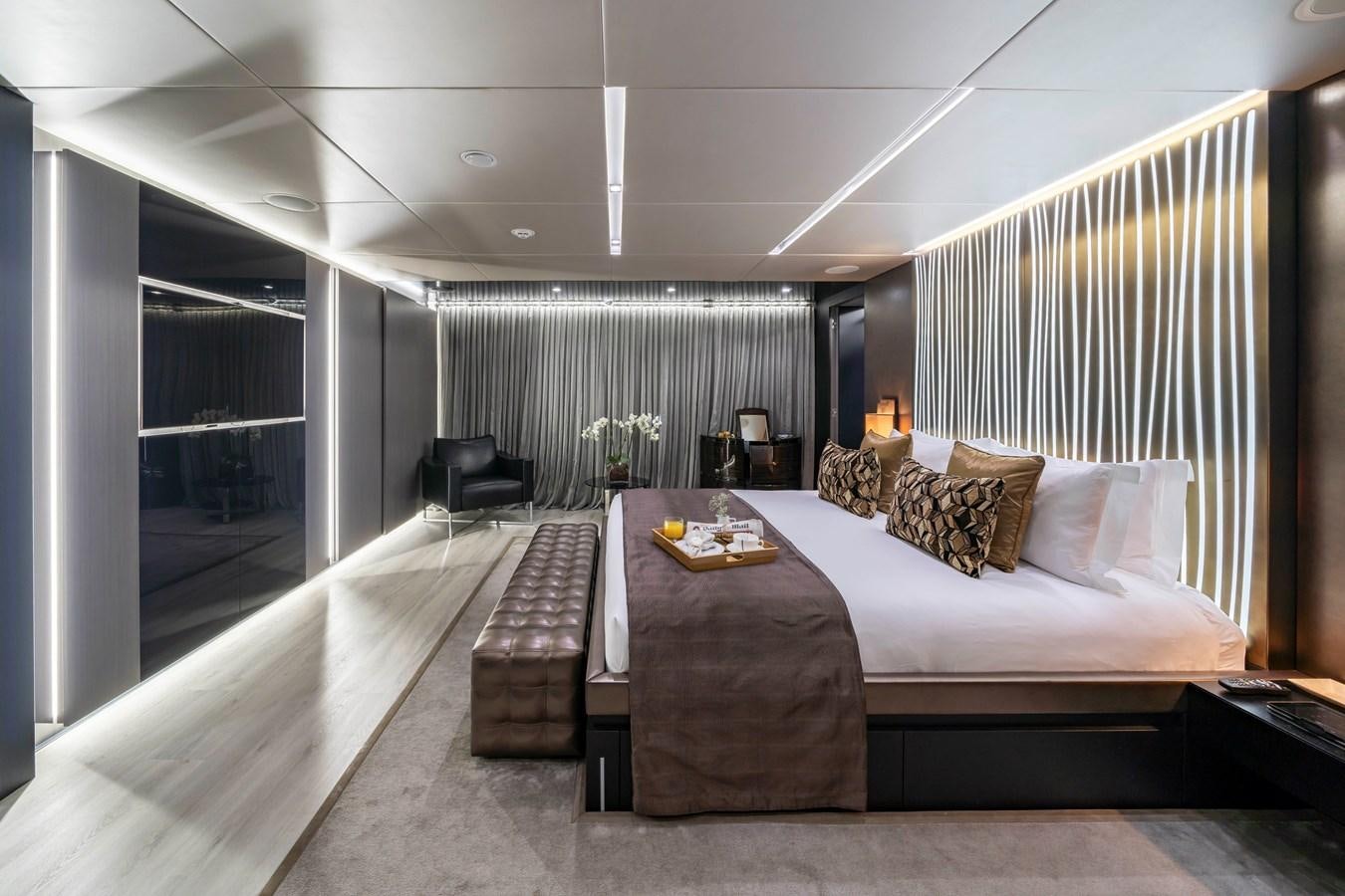 a large bedroom with a large bed aboard MAVERICK Yacht for Sale