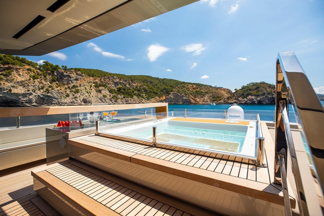 a pool on a deck aboard MAVERICK Yacht for Sale