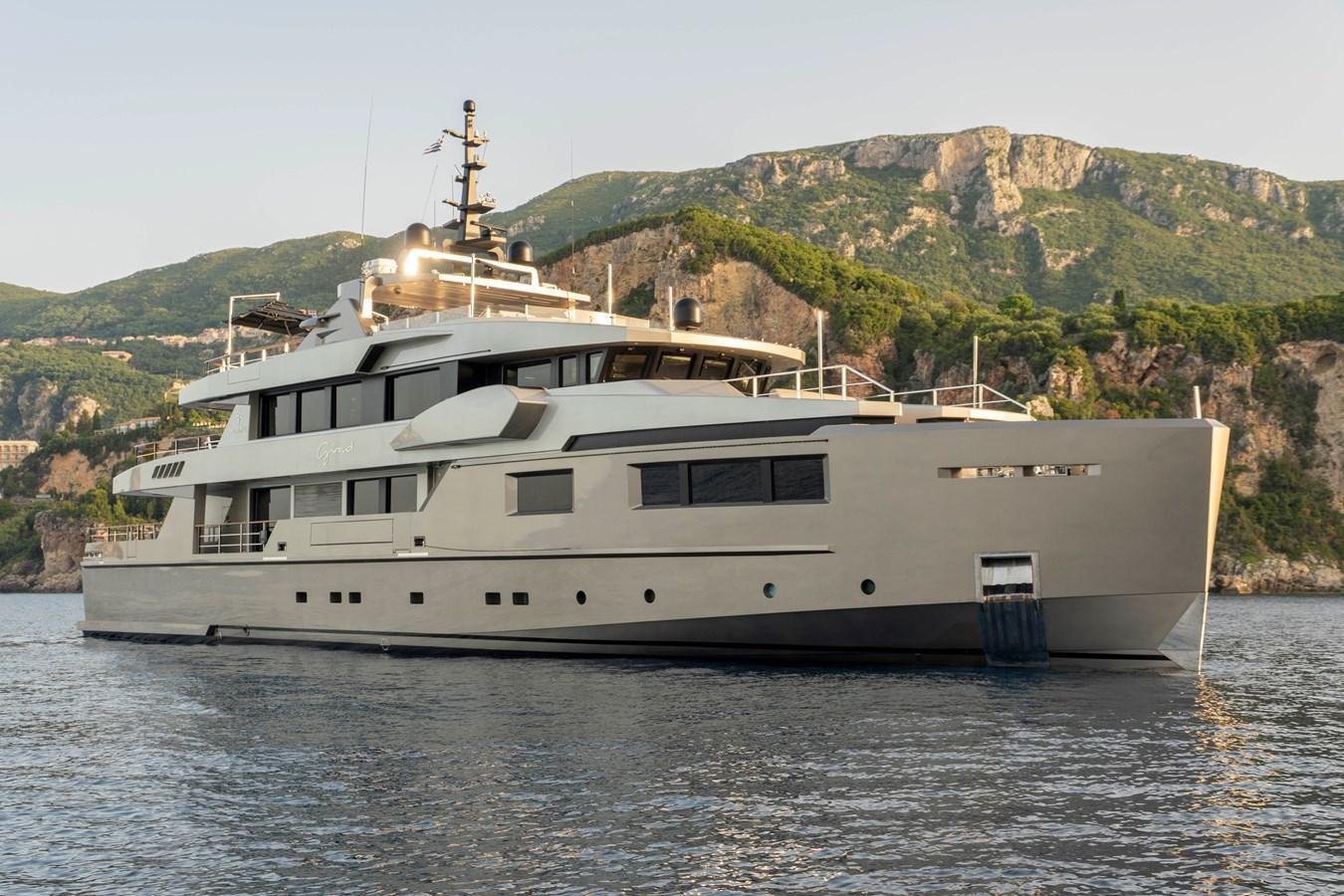 a large white boat on the water aboard MAVERICK Yacht for Sale