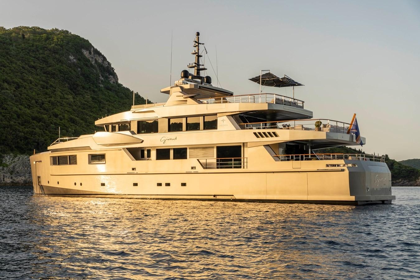 a large ship in the water aboard MAVERICK Yacht for Sale