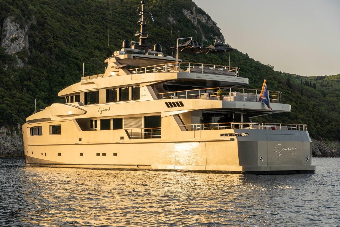 a large ship in the water aboard MAVERICK Yacht for Sale