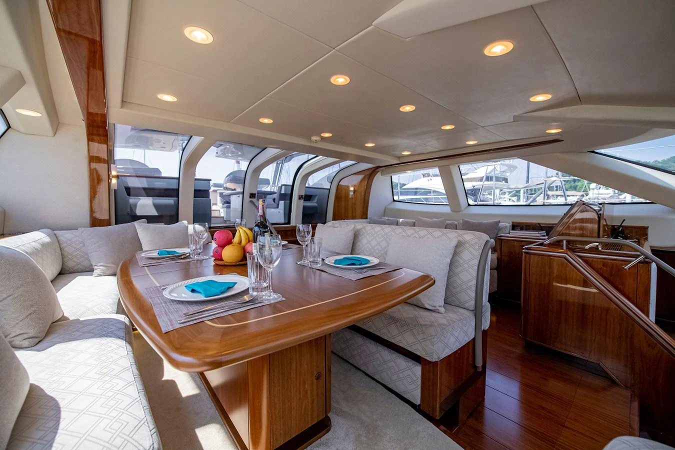 a table and chairs in a room aboard SERAFIM Yacht for Sale