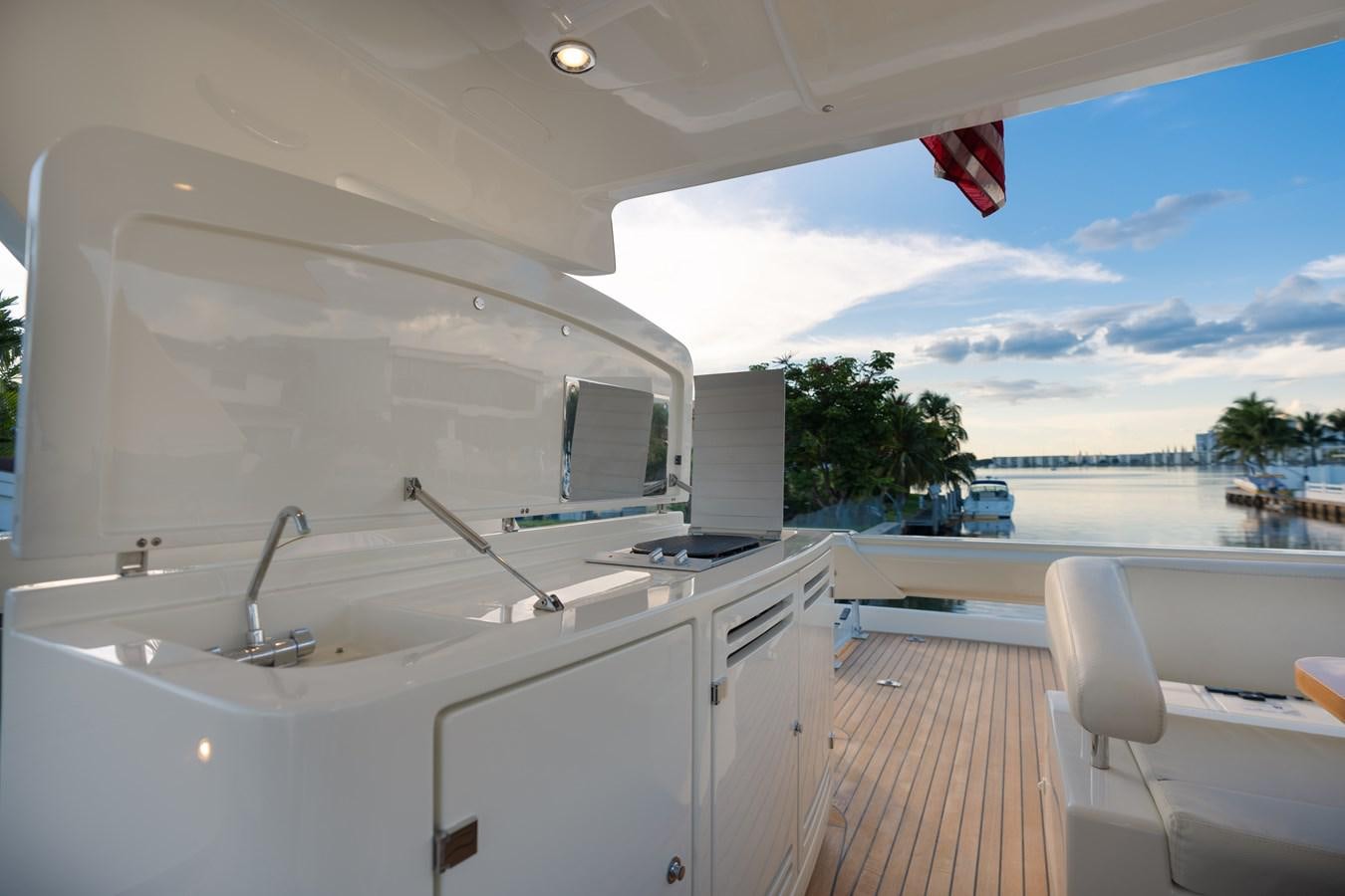 a large white kitchen with a pool aboard 75' RIVA 2012 Yacht for Sale