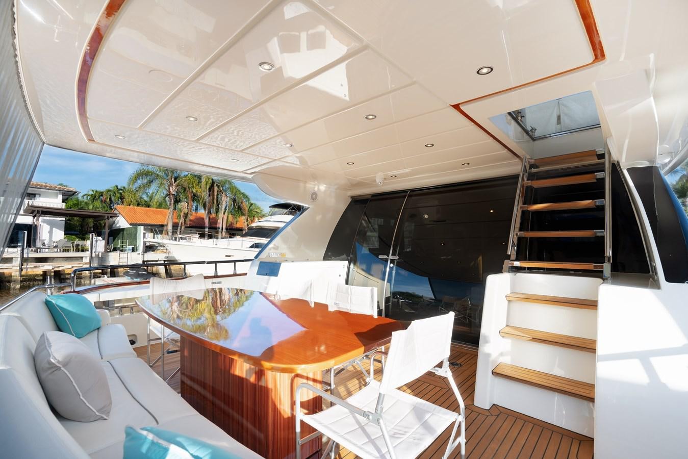 a boat with a deck and chairs aboard 75' RIVA 2012 Yacht for Sale