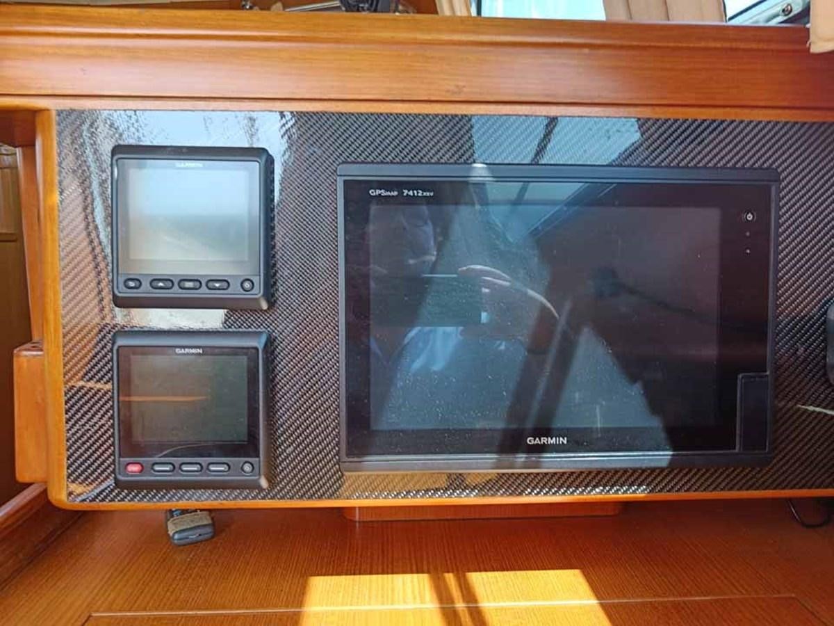 a couple of computer screens aboard PLUM Yacht for Sale