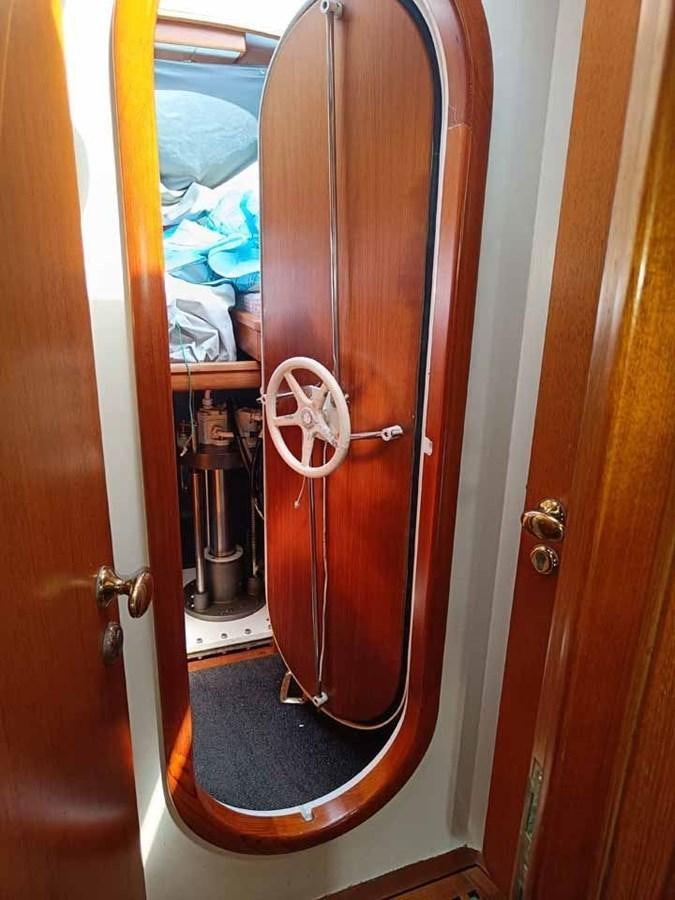 a door with a handle aboard PLUM Yacht for Sale