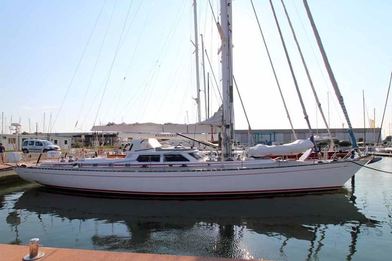 a boat in a harbor aboard PLUM Yacht for Sale