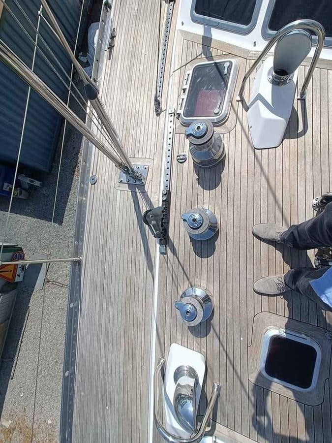 a truck with a large trailer aboard PLUM Yacht for Sale