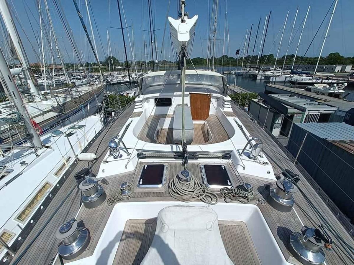 a large ship docked aboard PLUM Yacht for Sale