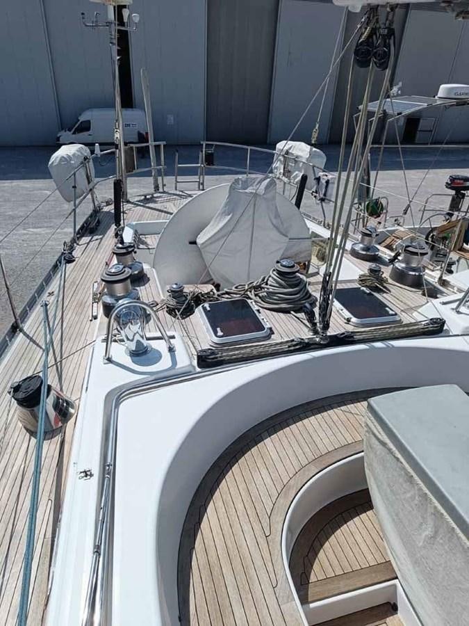 a large white machine with a large round metal object on top aboard PLUM Yacht for Sale