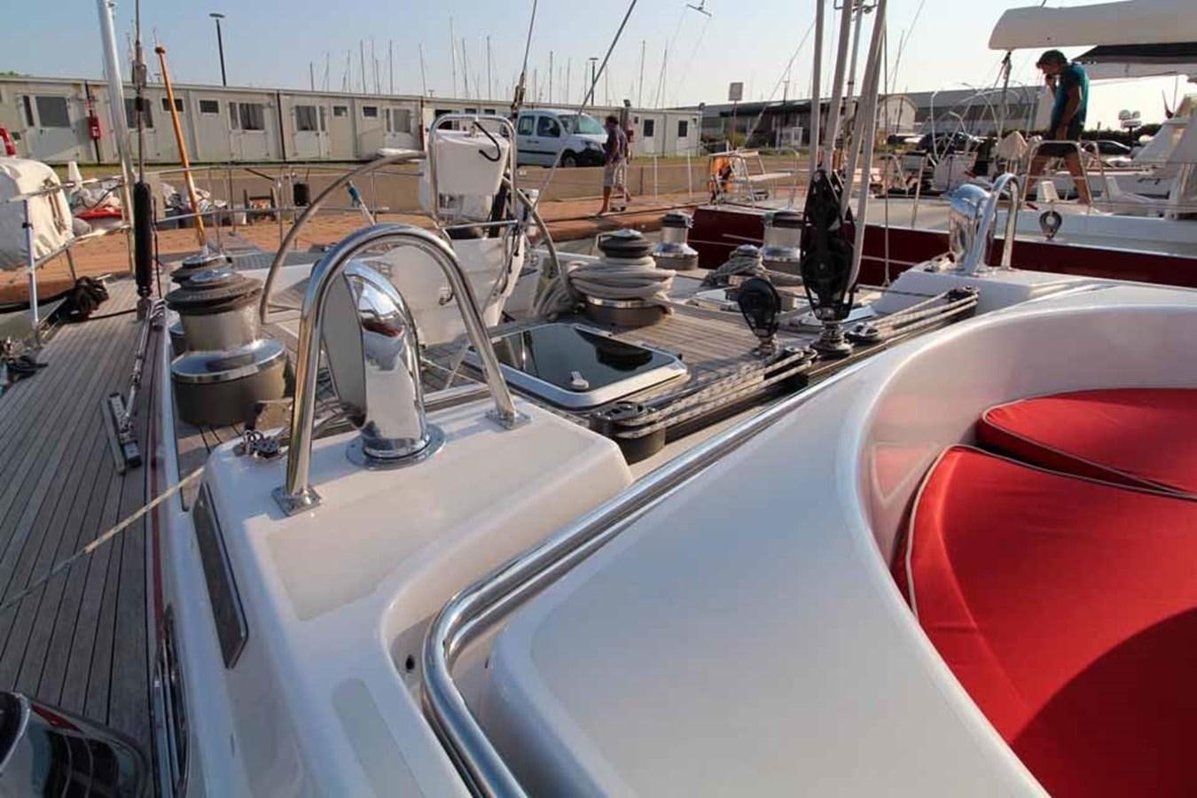 a boat with a steering wheel aboard PLUM Yacht for Sale