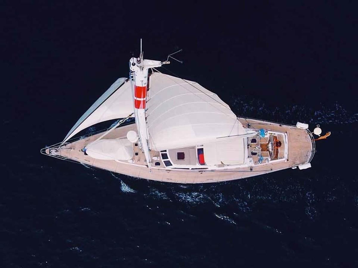 a white boat in the water aboard PLUM Yacht for Sale