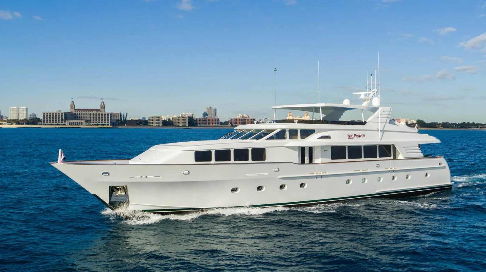 a white yacht in the water aboard HOG HEAVEN Yacht for Sale