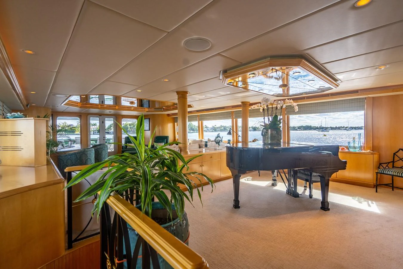 a room with a table and chairs aboard HOG HEAVEN Yacht for Sale