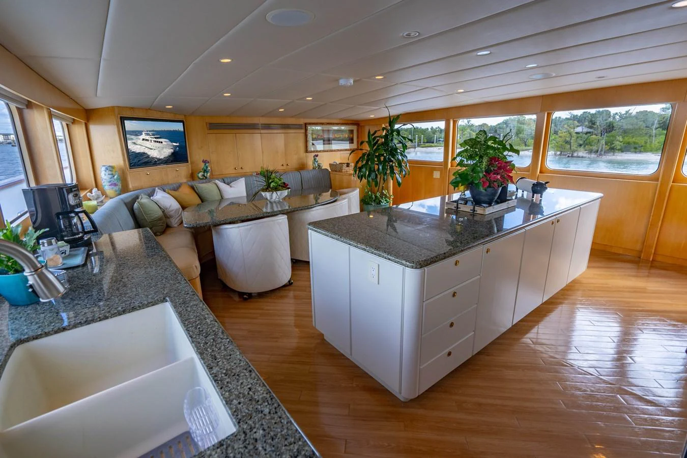 a large kitchen with a large island aboard HOG HEAVEN Yacht for Sale