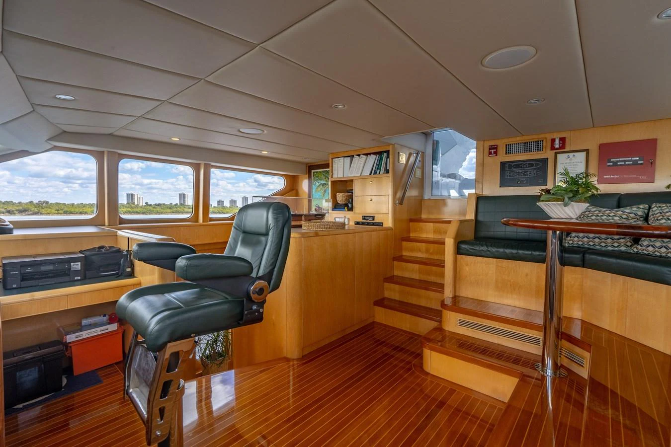 a room with a piano and a piano aboard HOG HEAVEN Yacht for Sale