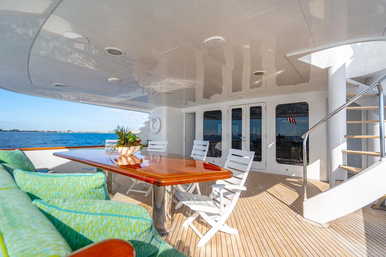 a room with a table and chairs aboard HOG HEAVEN Yacht for Sale
