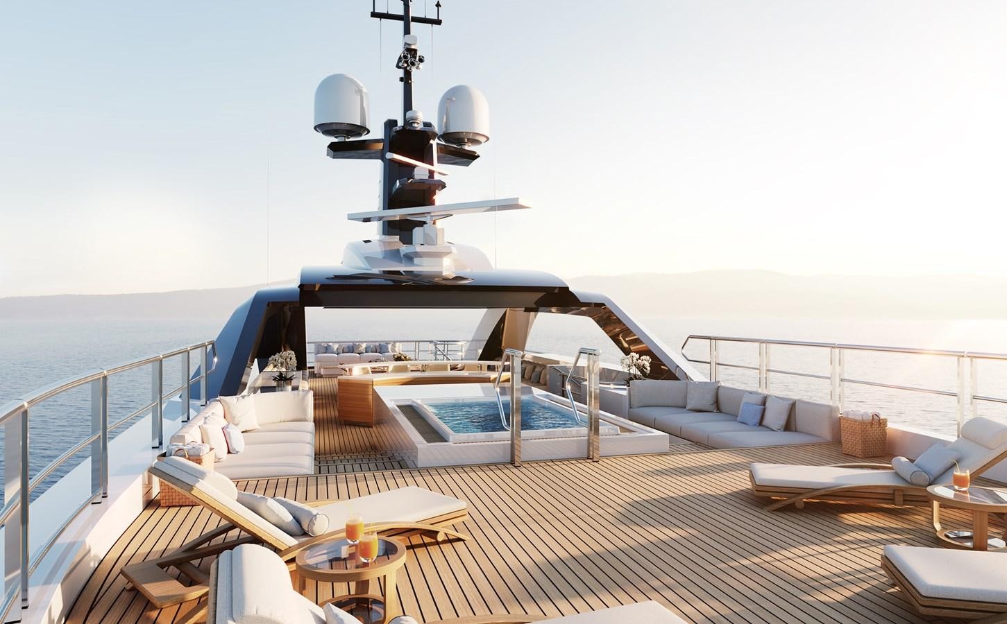 a deck with a bed and a table on it aboard AMELS 6004 Yacht for Sale