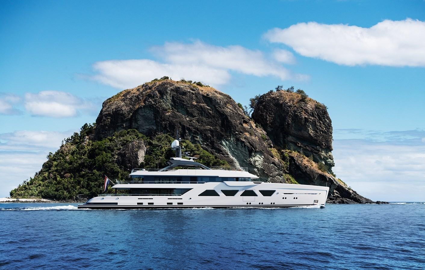 a boat on the water aboard AMELS 6004 Yacht for Sale