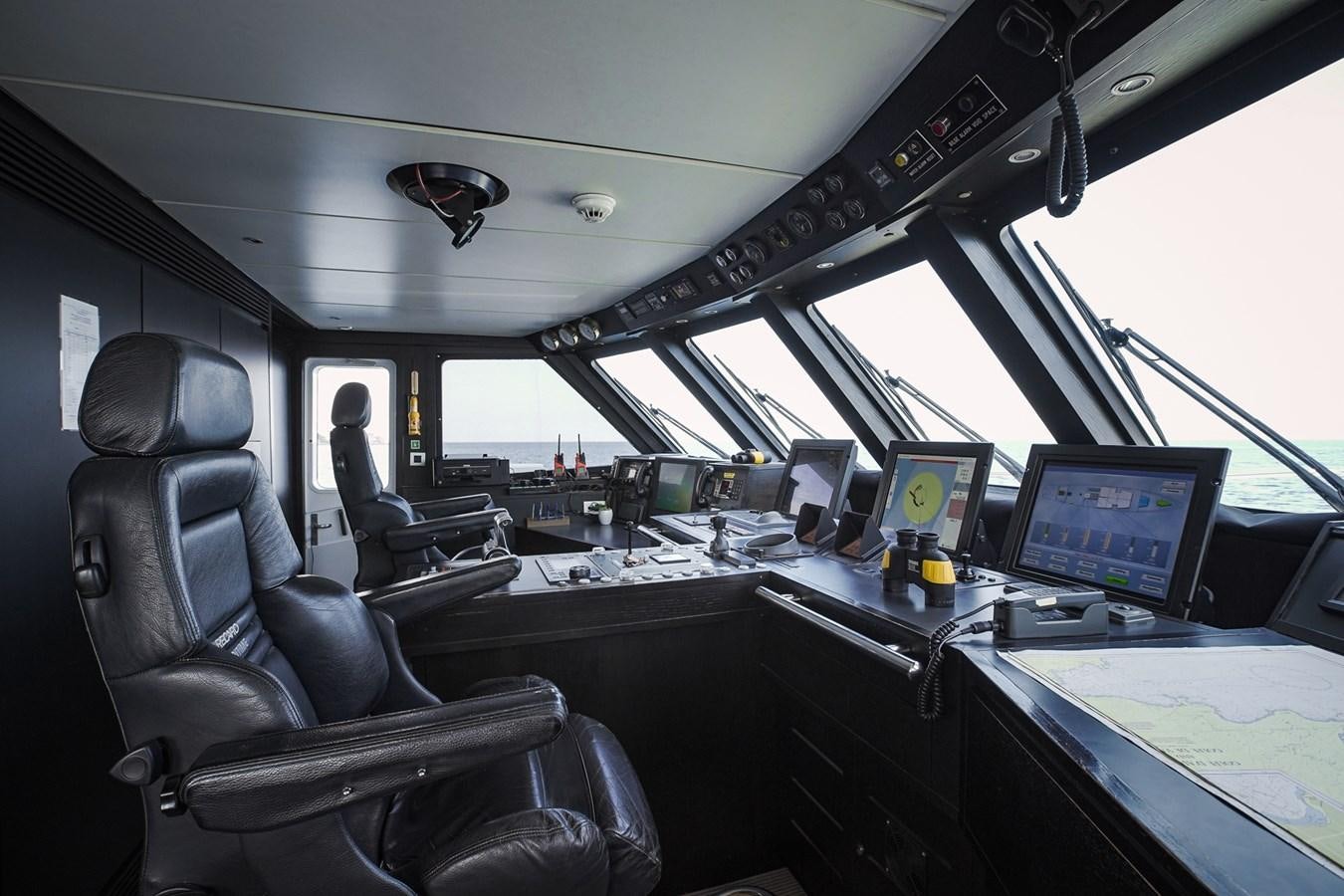 inside of a vehicle with computers aboard BERZINC Yacht for Charter