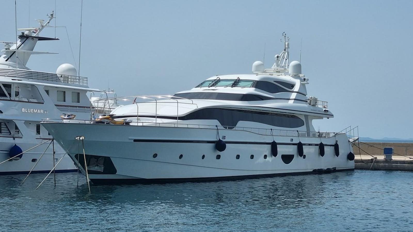 a couple of white yachts aboard CHOO CHOO Yacht for Sale