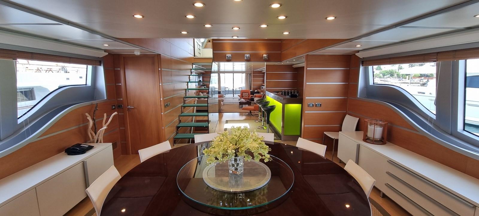 a room with a table and chairs aboard CHOO CHOO Yacht for Sale