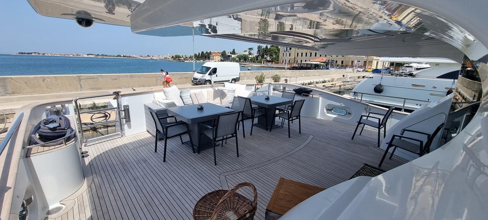 a room with a table and chairs aboard CHOO CHOO Yacht for Sale