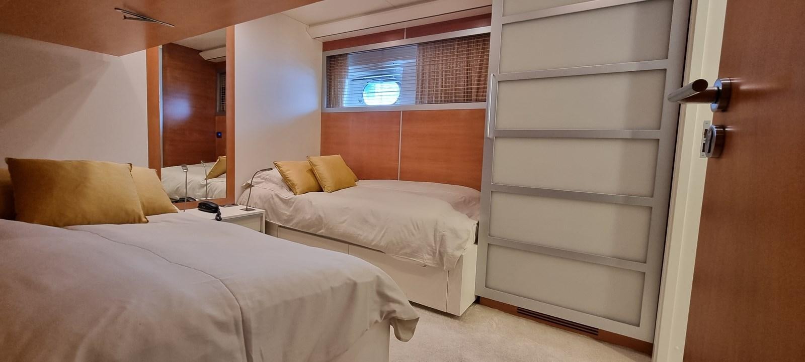 a room with two beds aboard CHOO CHOO Yacht for Sale