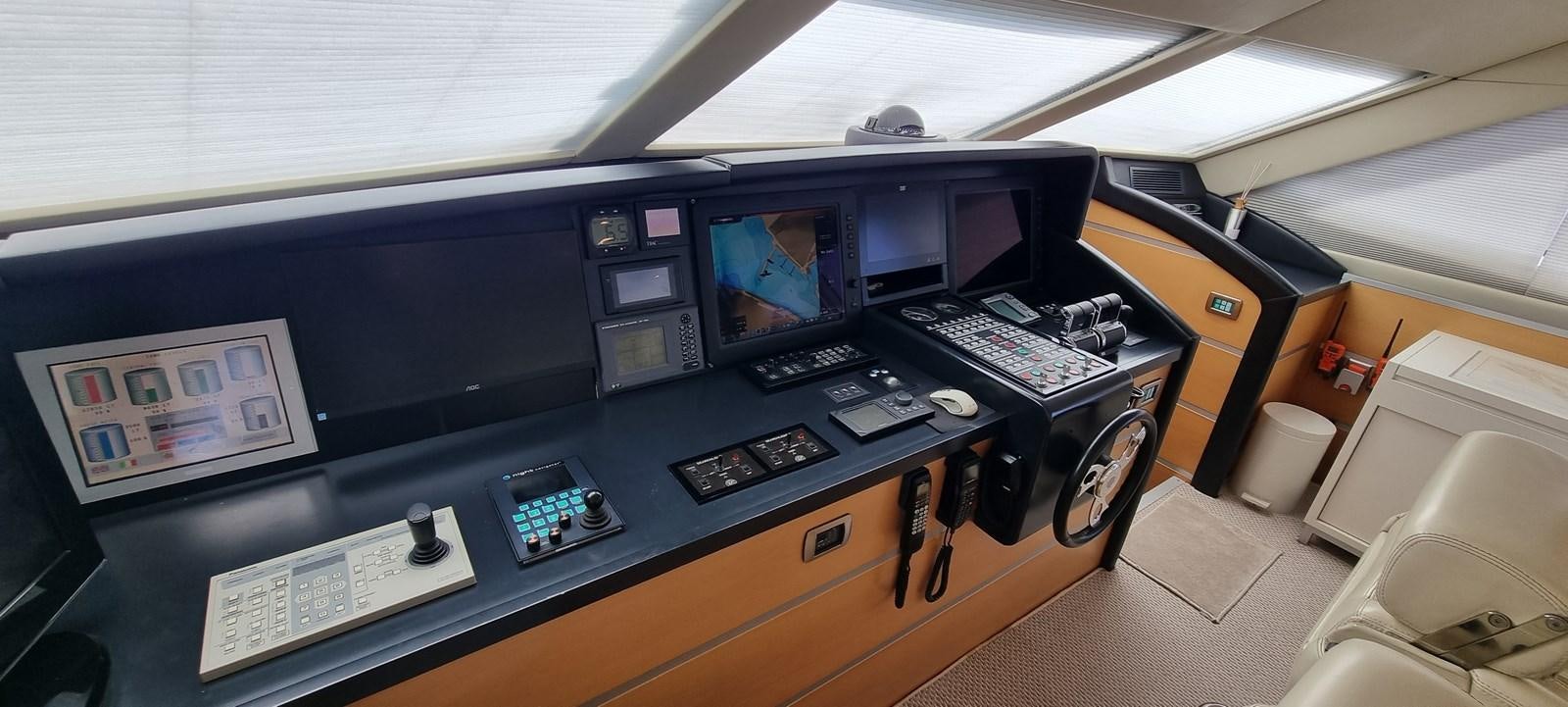 a control room with many monitors aboard CHOO CHOO Yacht for Sale