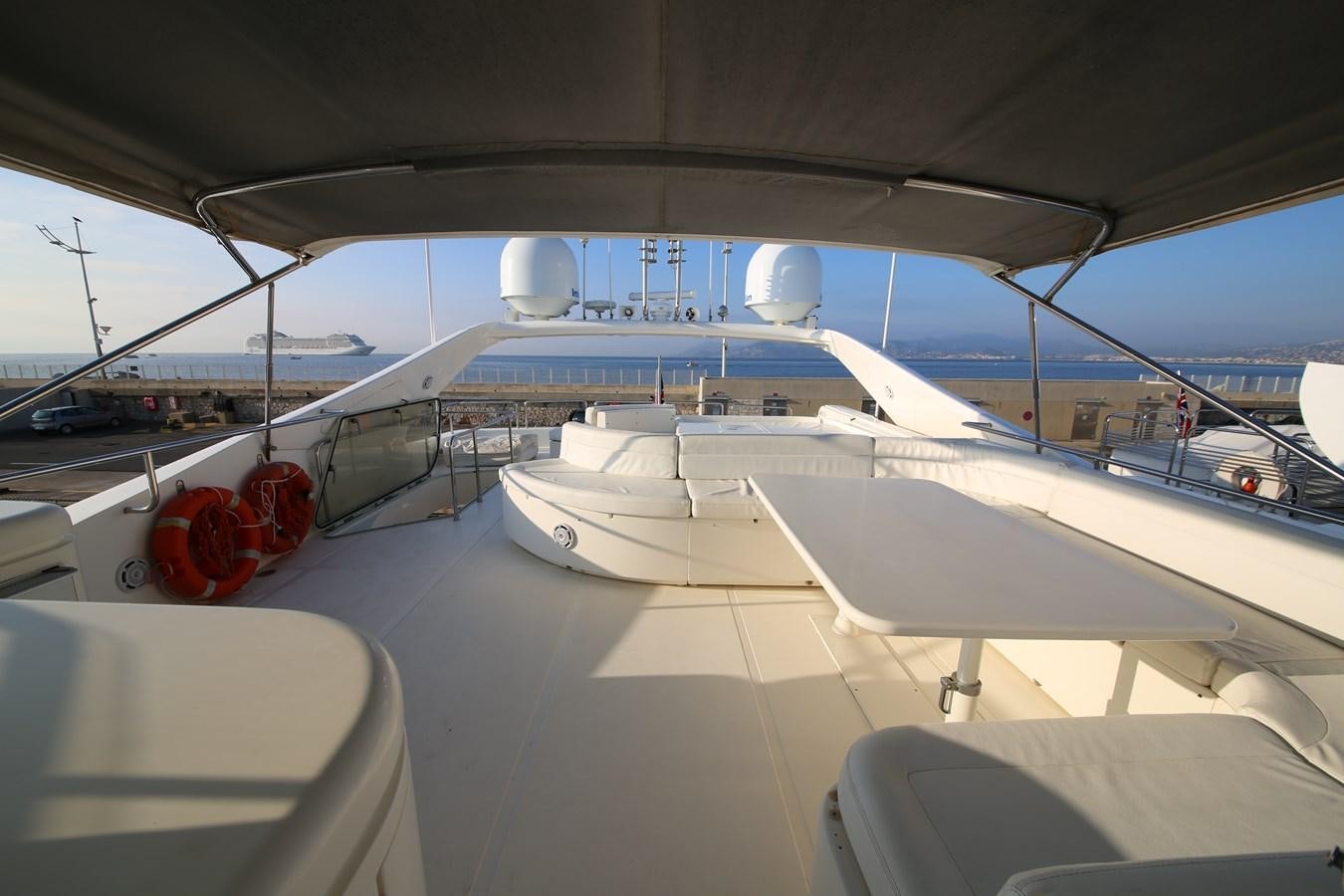 a plane parked at an airport aboard YOLO TOO Yacht for Sale