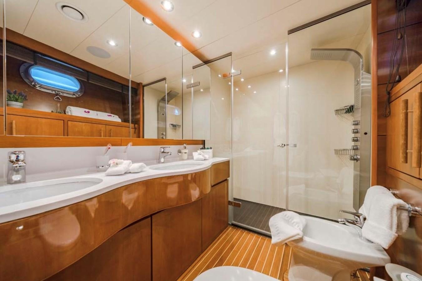 a bathroom with a large mirror aboard FIORENTE Yacht for Charter