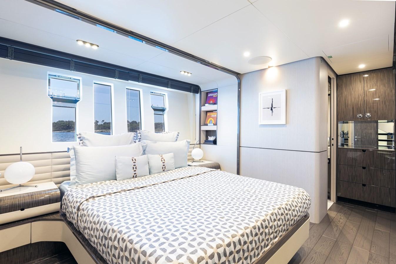 a large bedroom with a large bed aboard ANASTASIA V Yacht for Sale