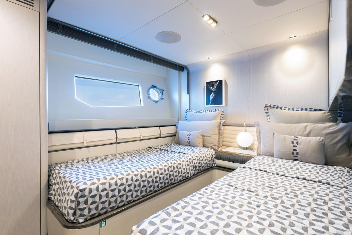 a room with two beds aboard ANASTASIA V Yacht for Sale