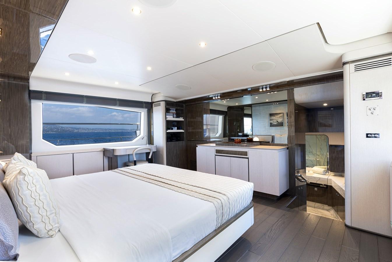 a large bedroom with a large bed aboard ANASTASIA V Yacht for Sale
