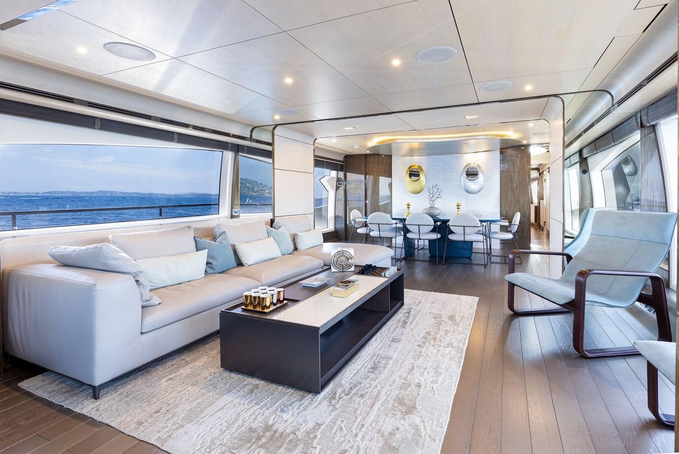 a living room with a large sofa aboard ANASTASIA V Yacht for Sale