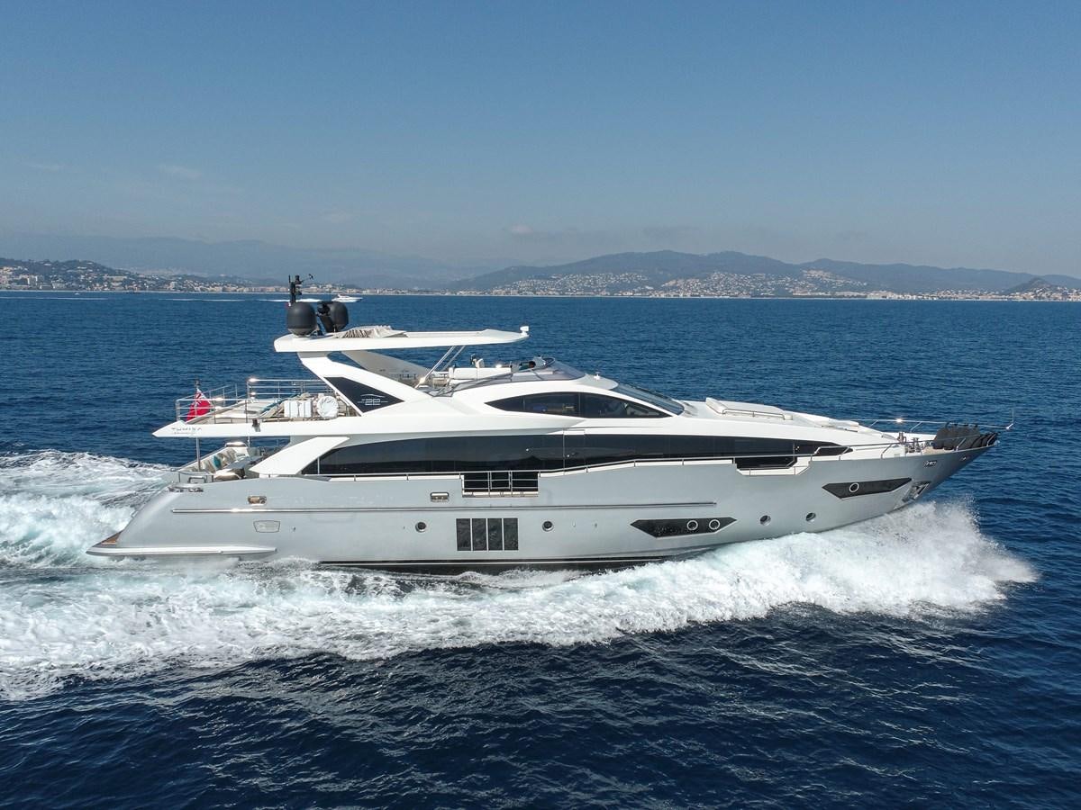 a white yacht on the water aboard ANASTASIA V Yacht for Sale