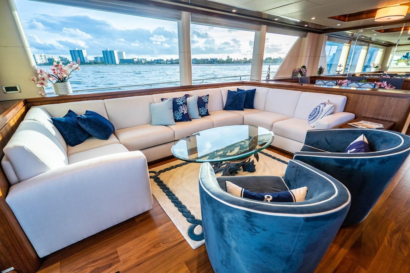a living room with a large window aboard PICO Yacht for Sale