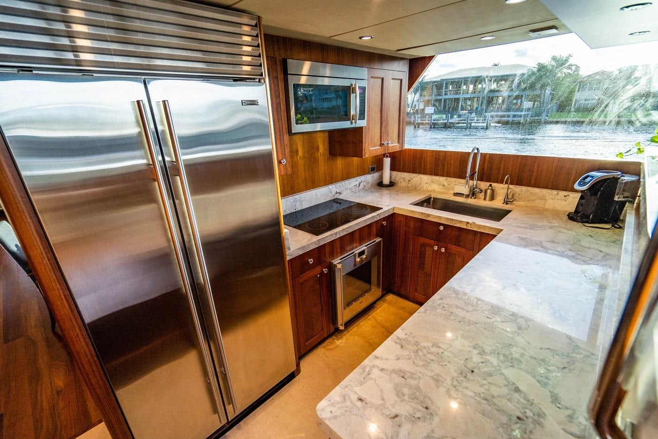 a kitchen with a large island aboard PICO Yacht for Sale