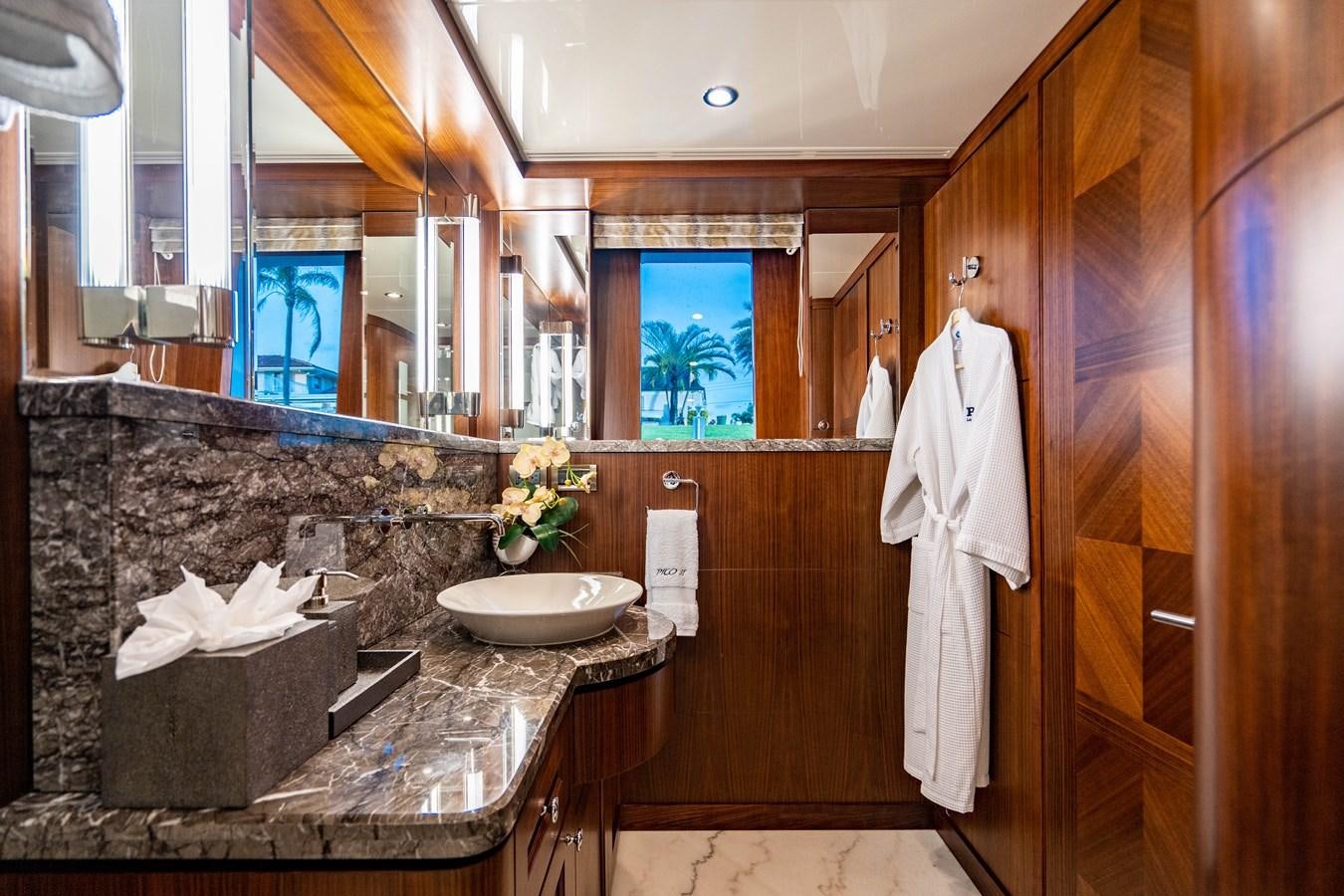 a bathroom with a sink and a mirror aboard PICO Yacht for Sale