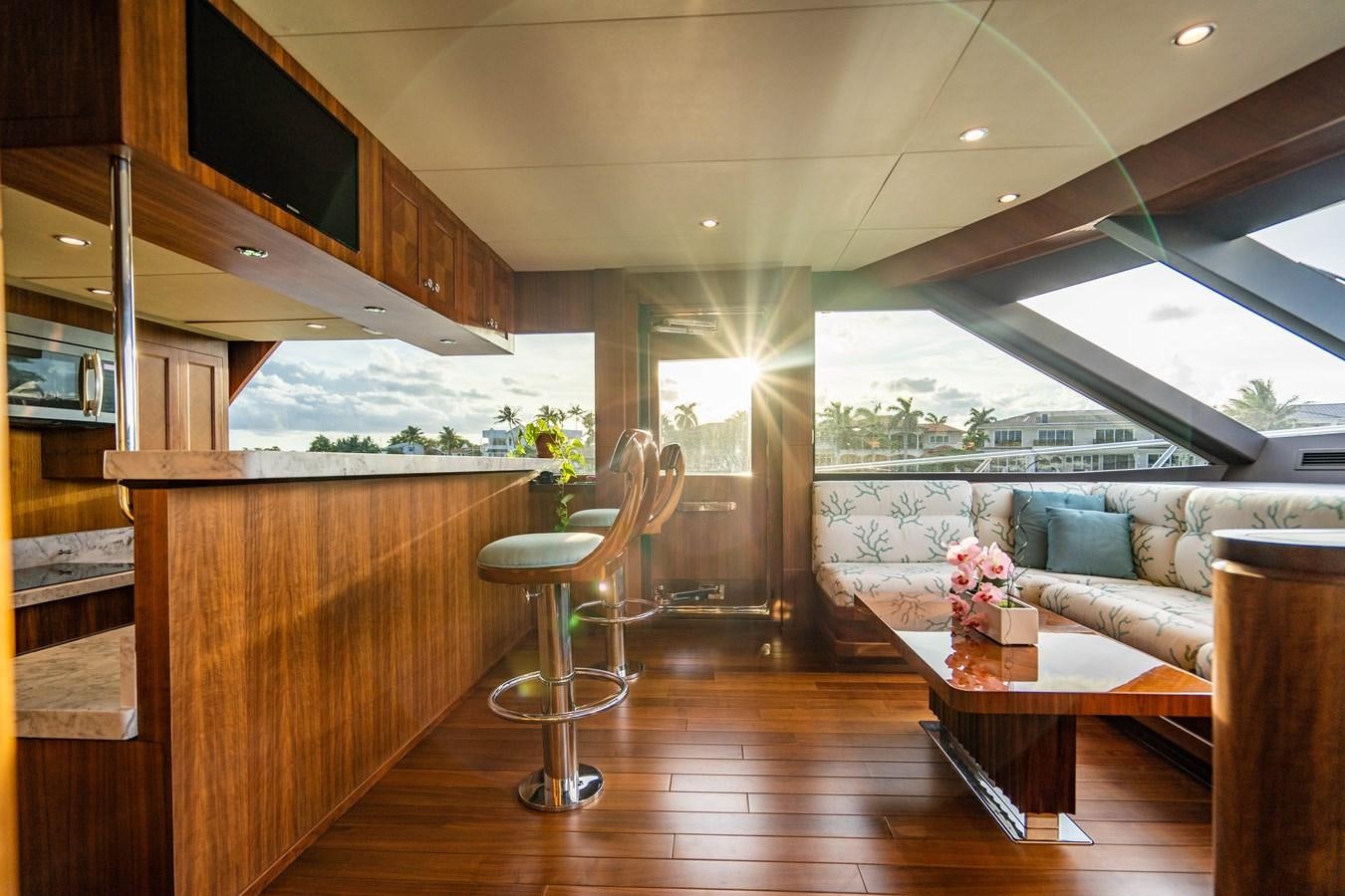 a room with a couch and a table and a chair aboard PICO Yacht for Sale
