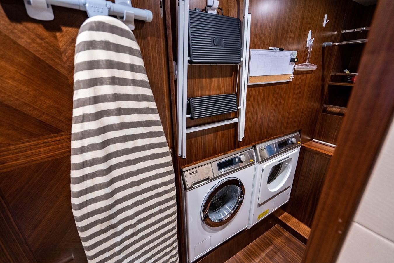 a kitchen with a stove and oven aboard PICO Yacht for Sale