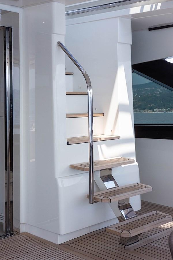 a ladder in a room aboard GV Yacht for Sale