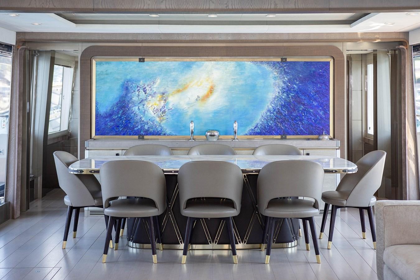 a large room with a large screen aboard GV Yacht for Sale
