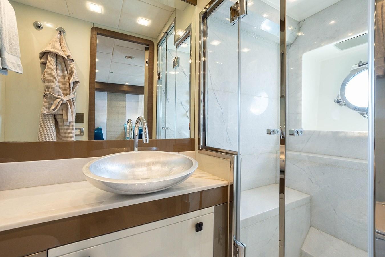 a bathroom with a sink and a bathtub aboard GV Yacht for Sale