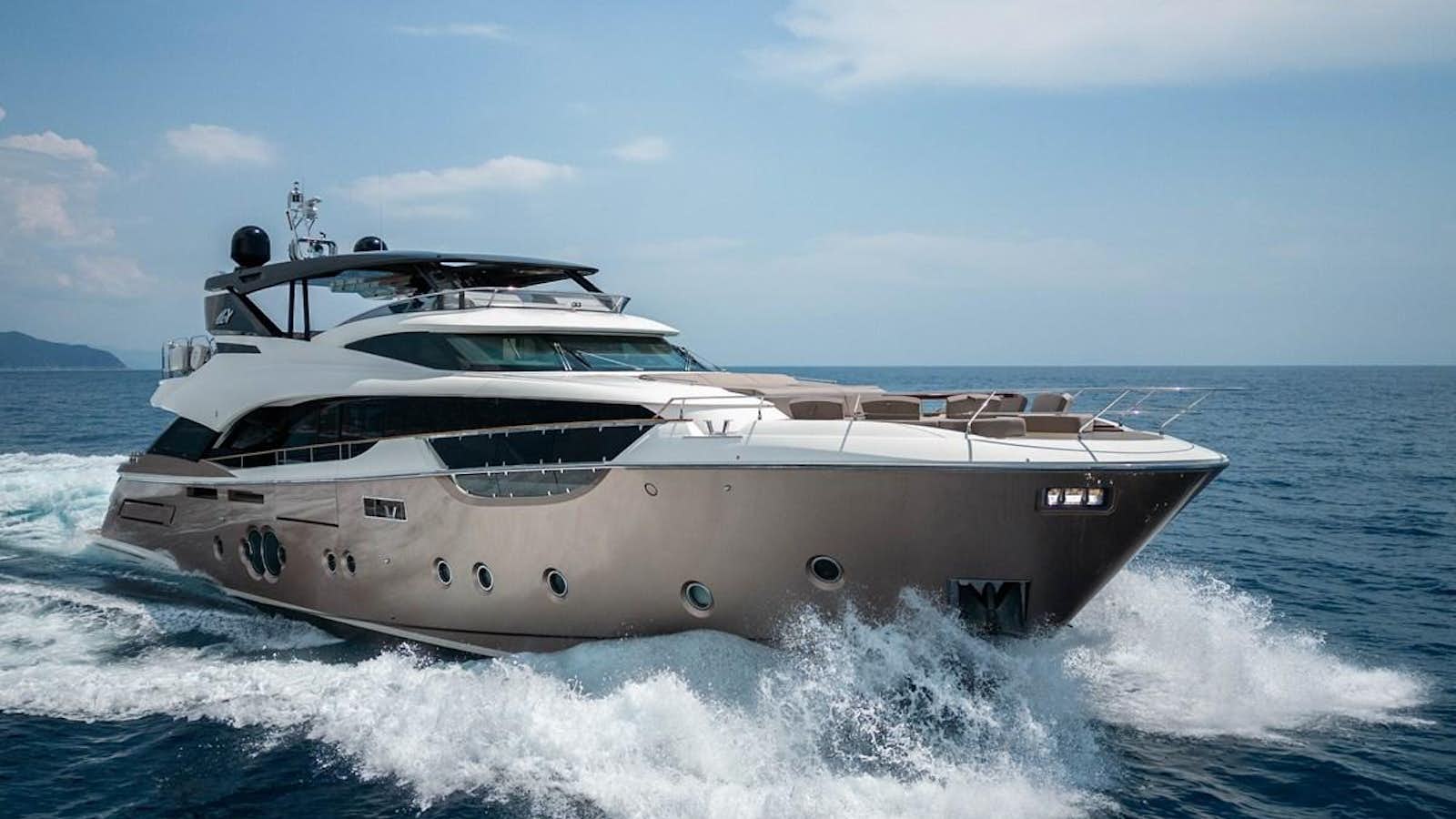 a yacht on the water aboard MIA MCY Yacht for Sale