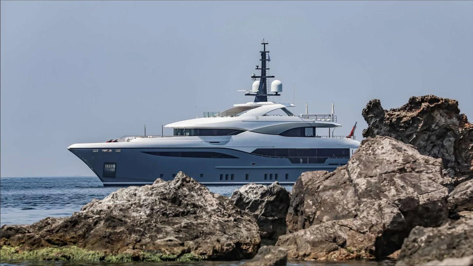 a boat on a rocky shore aboard MOONRAKER Yacht for Sale