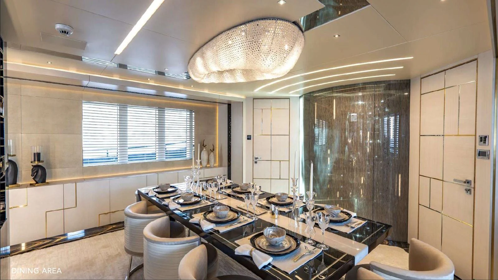 a kitchen with a large chandelier aboard MOONRAKER Yacht for Sale